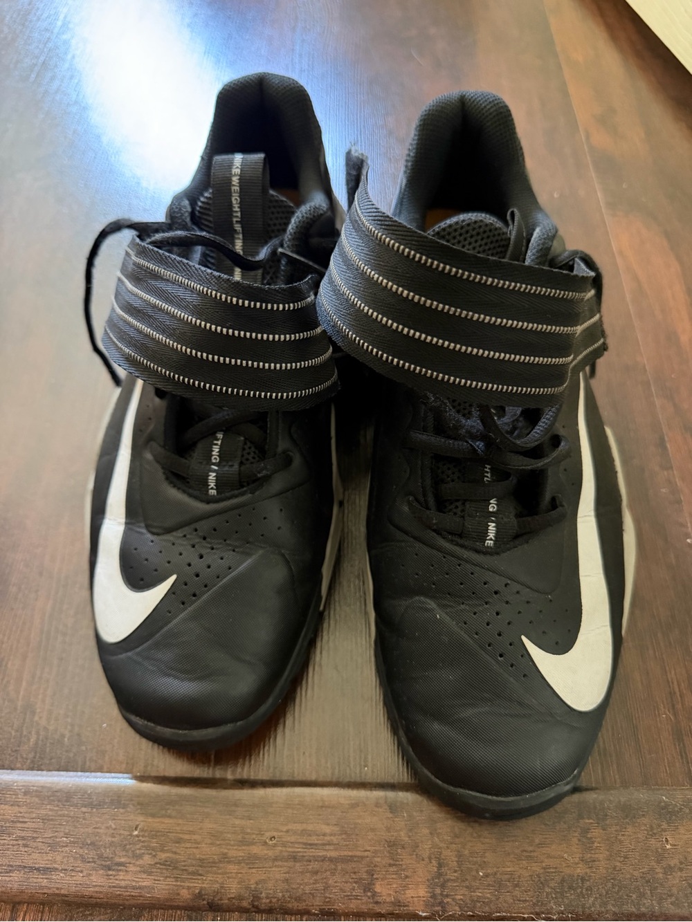 Nike Kids Black Sneakers with White Swoosh